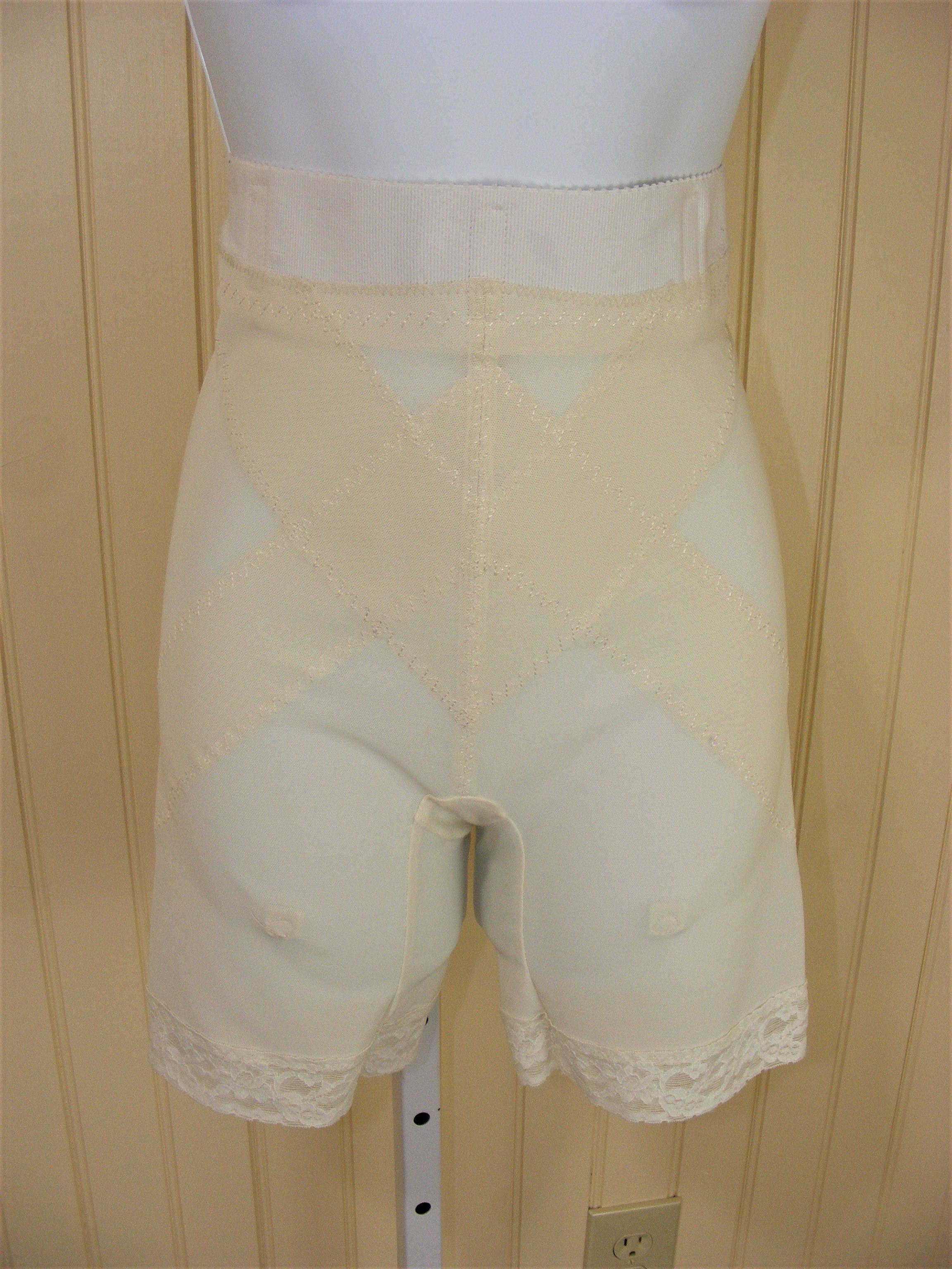 http://shopthrilling.com/cdn/shop/products/60-s-long-leg-girdle-corset-by-sears-by-sears-product-image__b7zp6a4s9.jpg?v=1624393472
