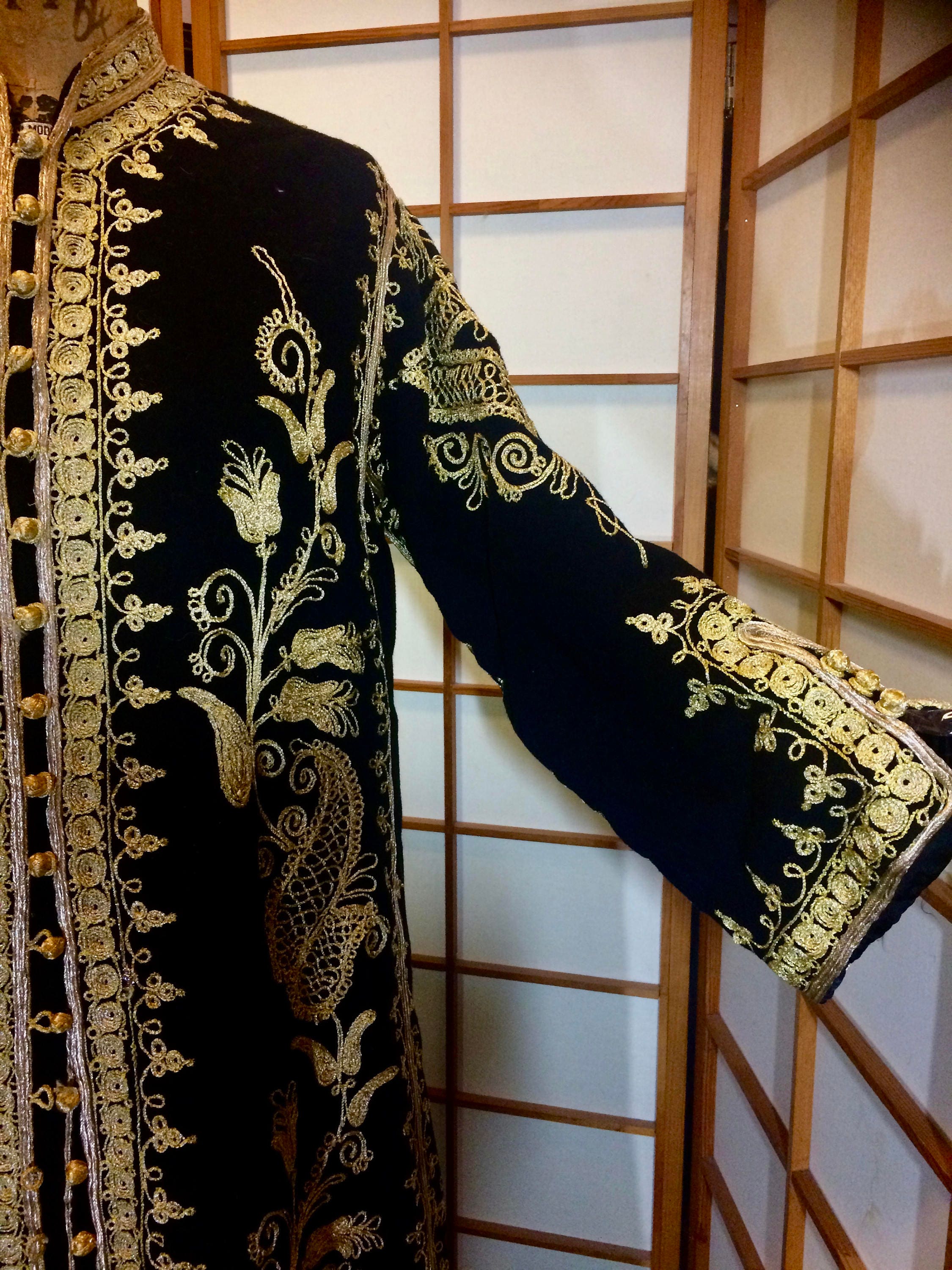 Gold embellished coat