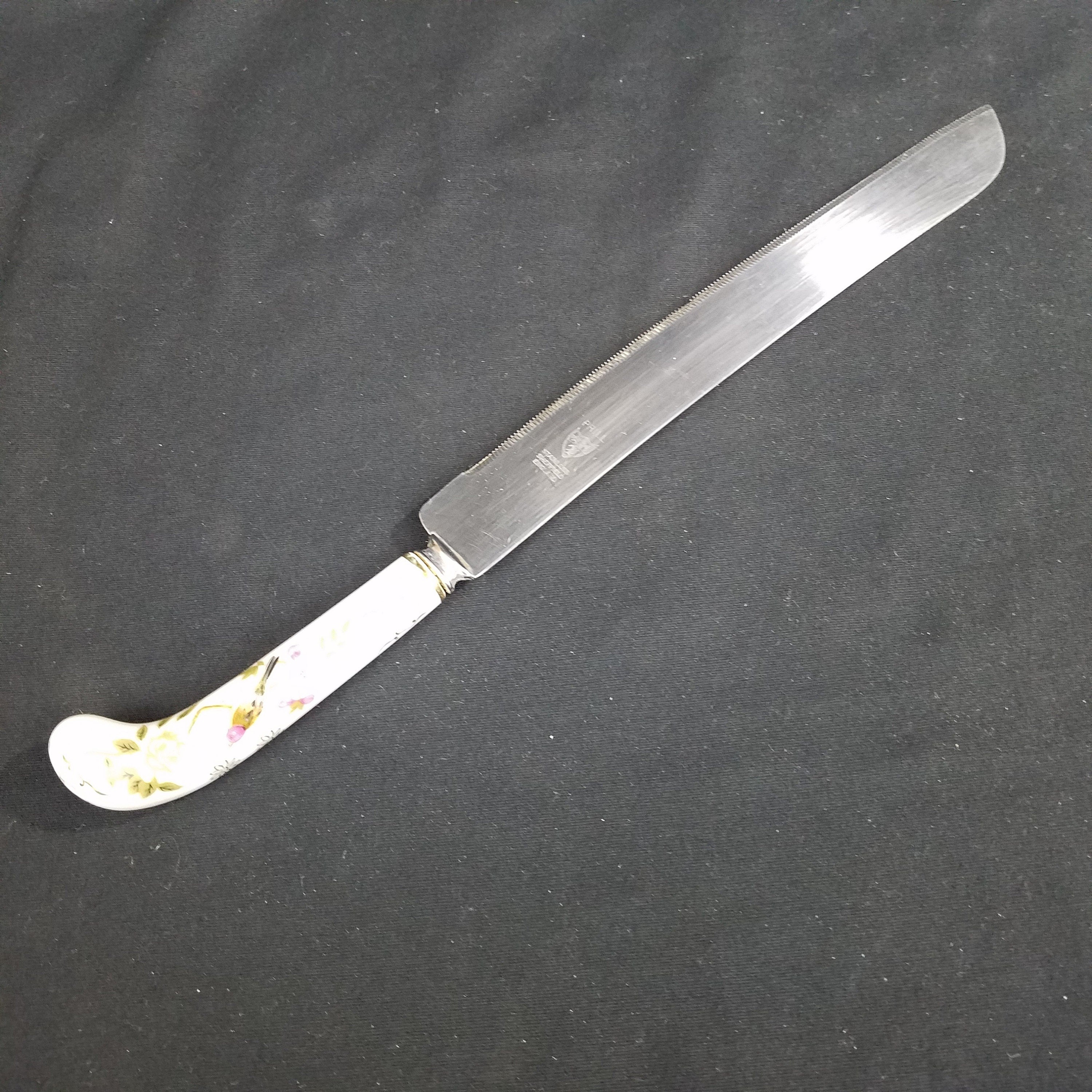 Stainless Steel Serrated Knives With Pearl Handle. Sheffield