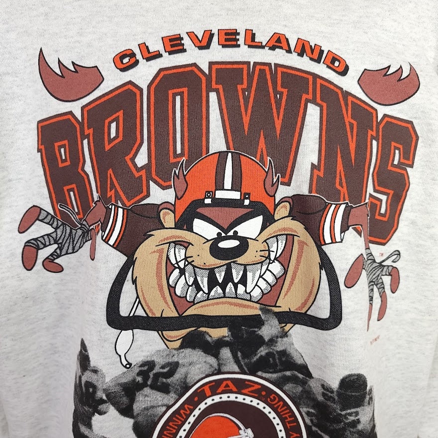 One vintage 1990's Cleveland Browns graphic tee, Looney Tunes cartoon  characters shirt, size XL - Crew neckline. - Text o…