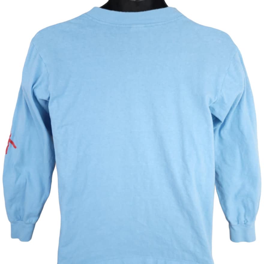 Tennessee Tennesee Titans Pigskin Long Sleeve Tee from Homage. | Officially Licensed Vintage NFL Apparel from Homage Pro Shop.