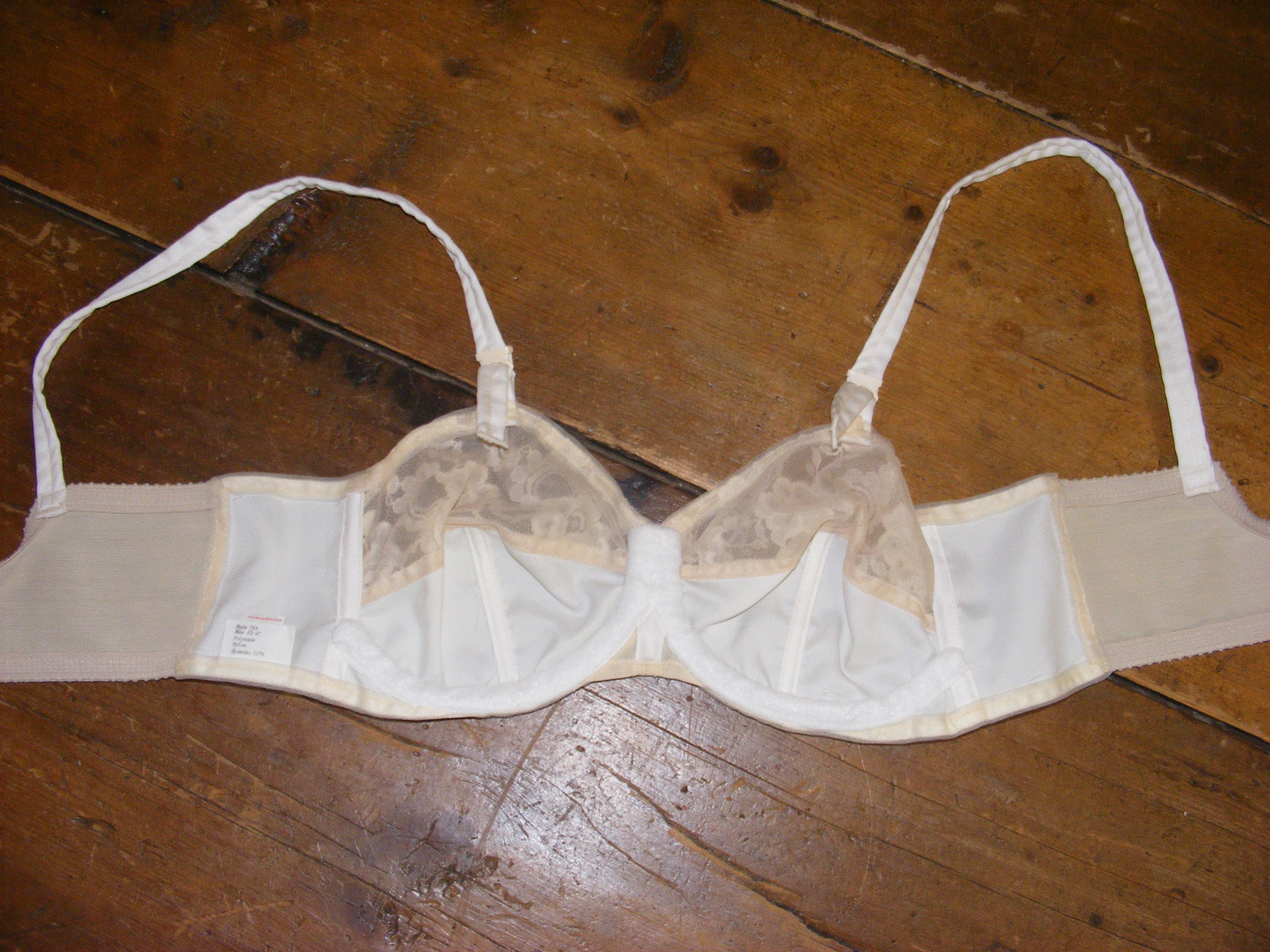 http://shopthrilling.com/cdn/shop/products/ivory-lace-cup-bra-32-c-deadstock-by-edith-lances-by-edith-lances-product-image__a759rylck.jpg?v=1621451356