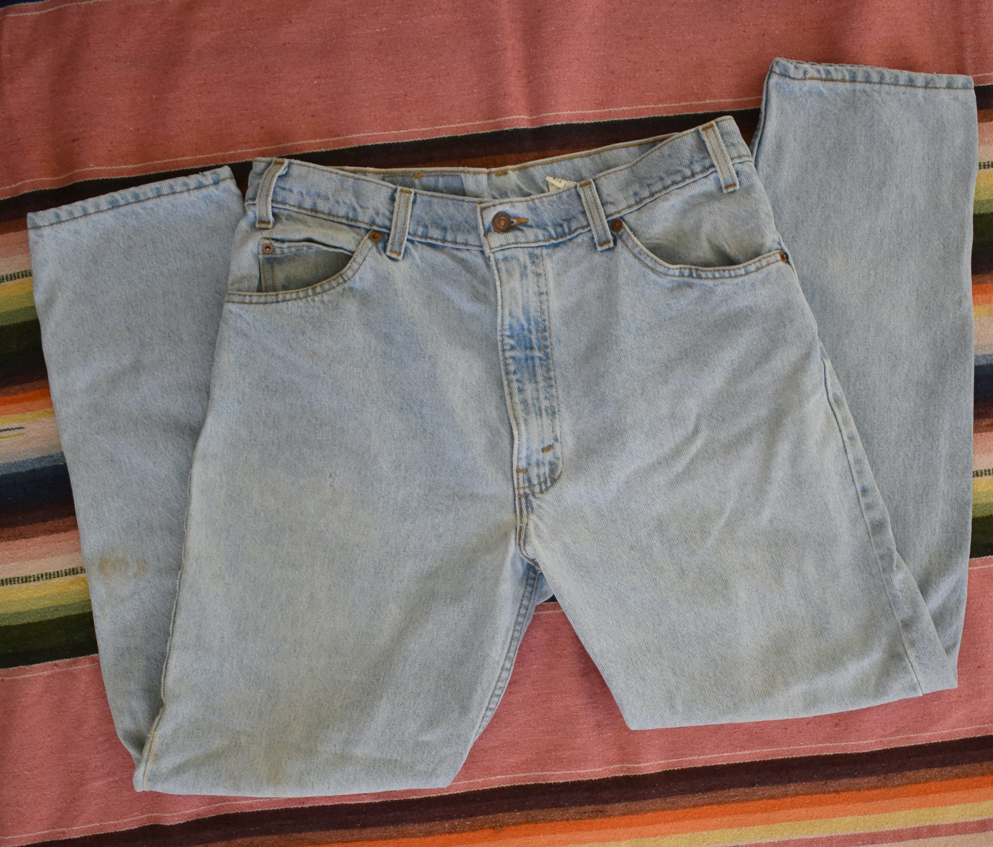 Vintage 90's Orange Tab Light Wash Denim Jeans by Levi's | Shop THRILLING